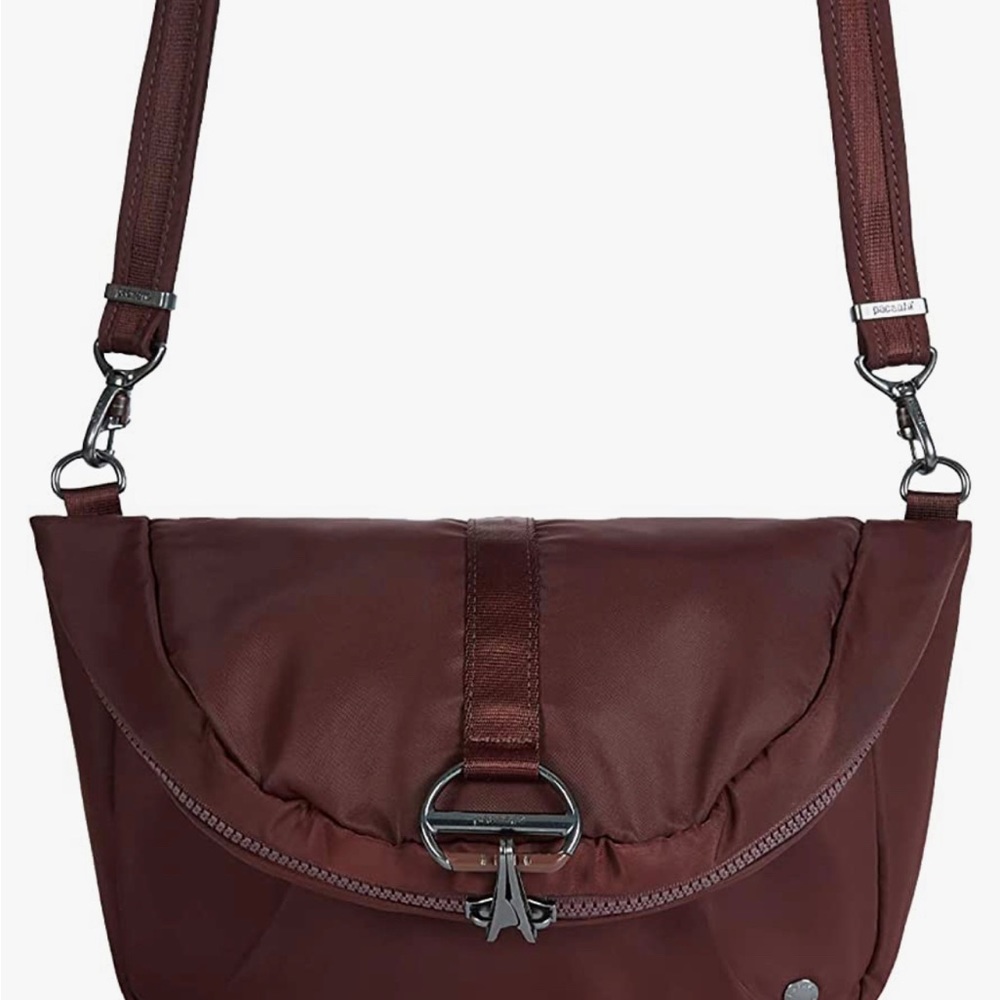 PacSafe convertible travel backpack crossbody. Color Merlot.